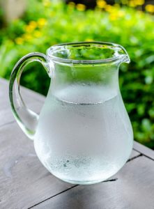 Frosty pitcher of drinking water.